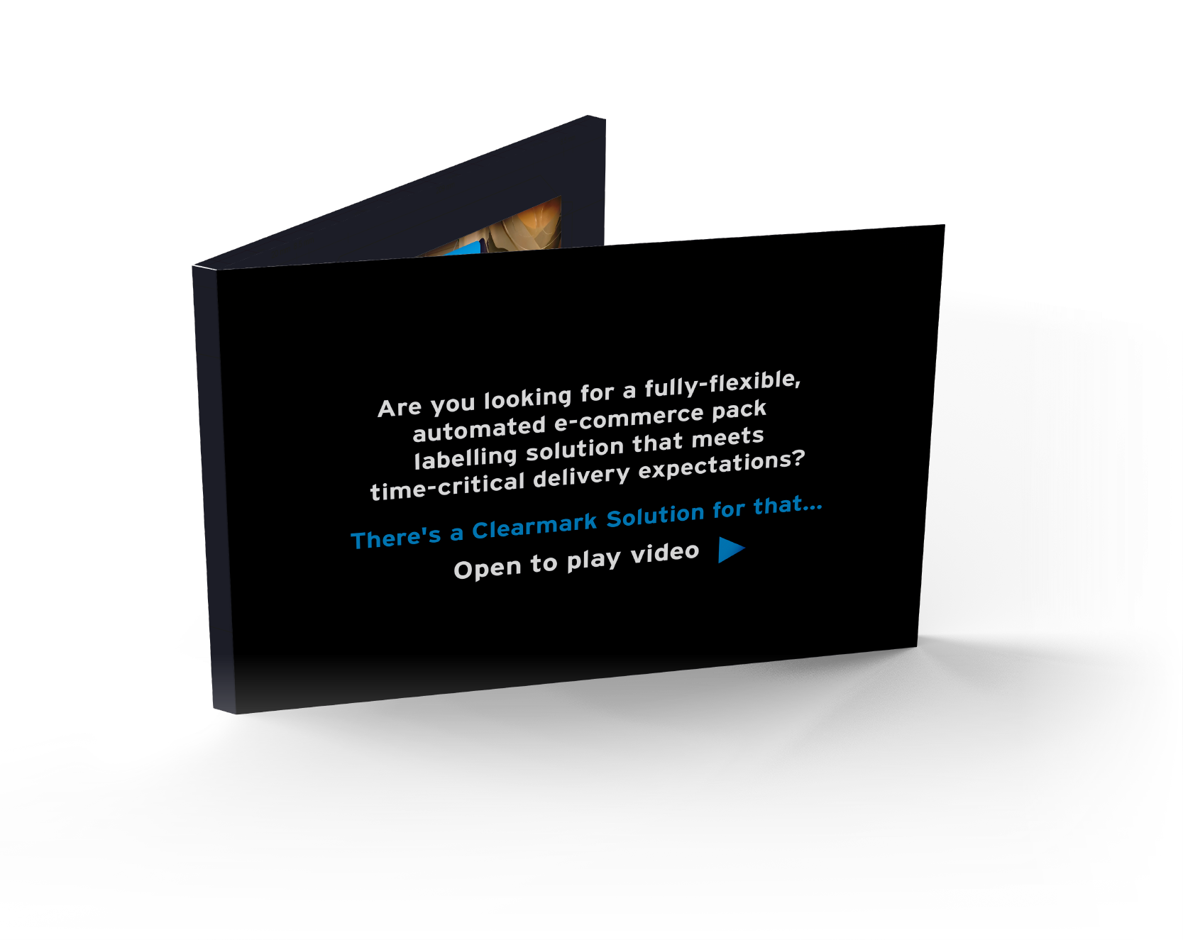 a folded black video mailer with white text on the front and a small amount of the video screen inside visible